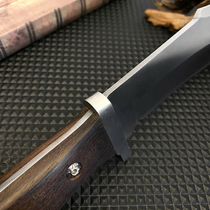 Stainless steel hunting knife with a wooden handle